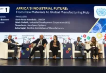 Manufacturing Indaba Expands to Cape Town with Major New Manufacturing Summit Panel of five speakers seated on stage during a conference panel on Africa's industrial future, with UNIDO banner in background and audience seating offstage.
